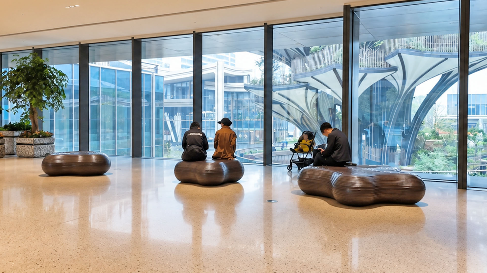 People quietly relax while facing a giant architectural tree outside ...