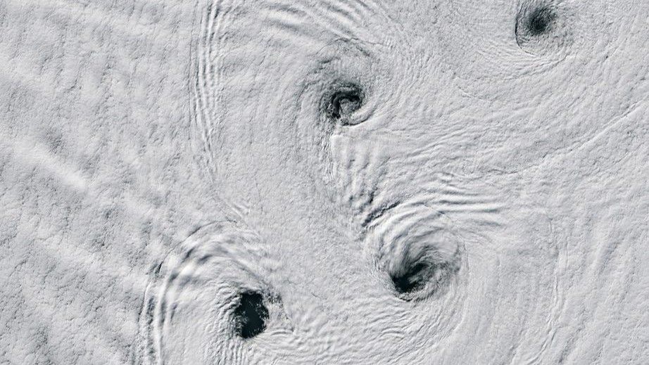 Mesmerizing vortexes swirl near an Antarctic volcano | Space photo of ...