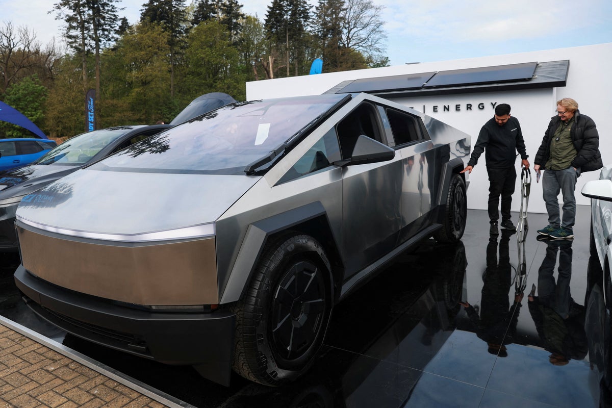 Visitors view a Tesla Cybertruck electric car on display at the Everything Electric North show in Harrogate, UK, on 8 May, 2026
