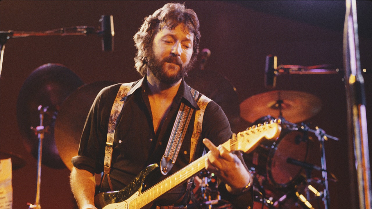 Eric Clapton hit in the chest by fan-thrown object, cuts concert short