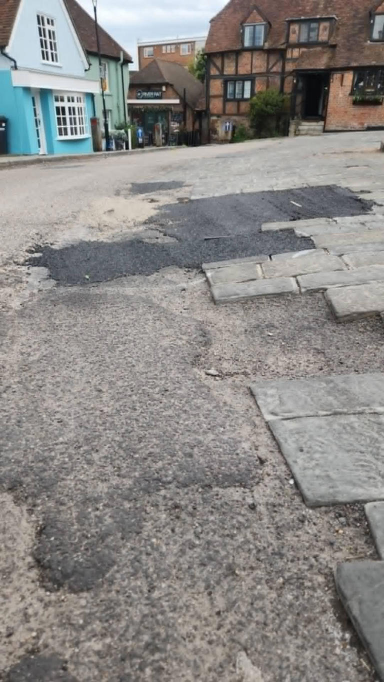 Potholes and botched repairs makes village look ‘neglected and tired’