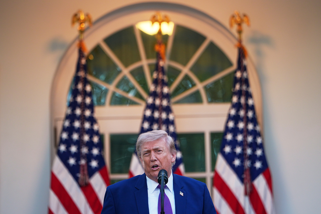 The latest: Trump departs for high-stakes China summit as Iran war looms