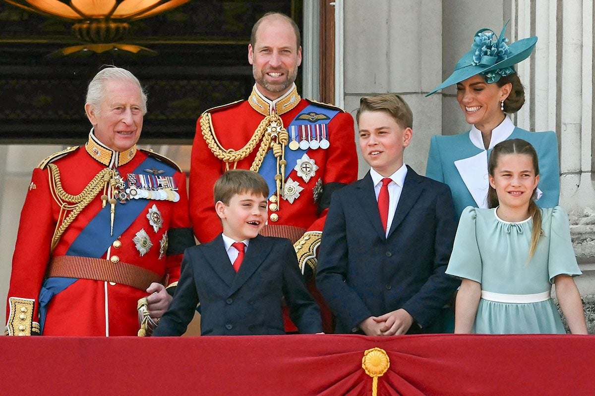 Here’s what the royal family is actually doing when they’re standing on the balcony