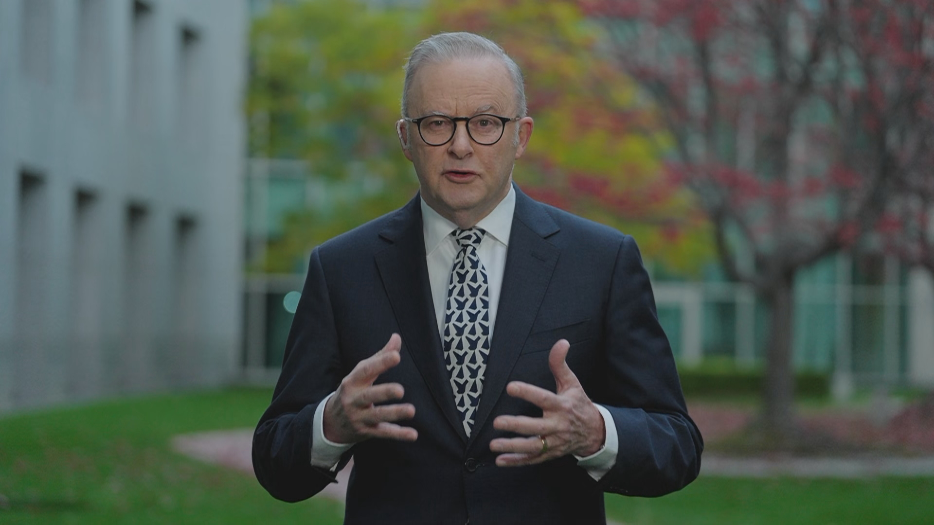 PM defends broken pledge on property tax