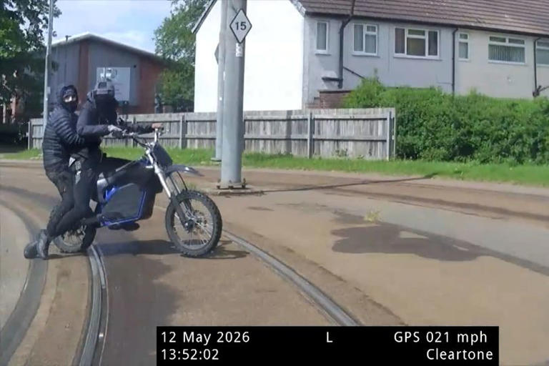 Watch moment police car rams e-bike sending rider cartwheeling over the ...