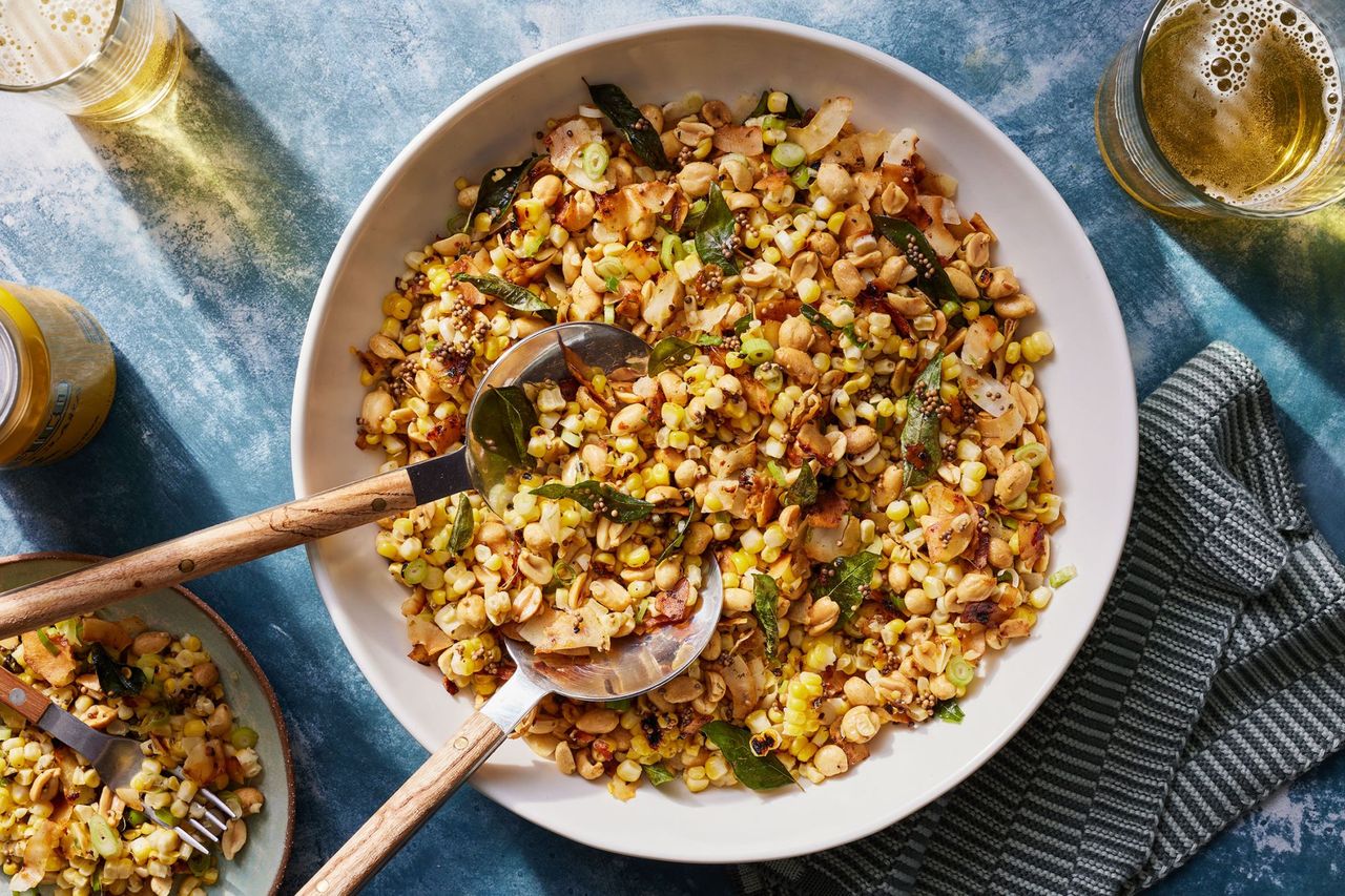 Overhead view of a serving bowl filled with Grilled Corn Salad with Coconut Peanut Chaat