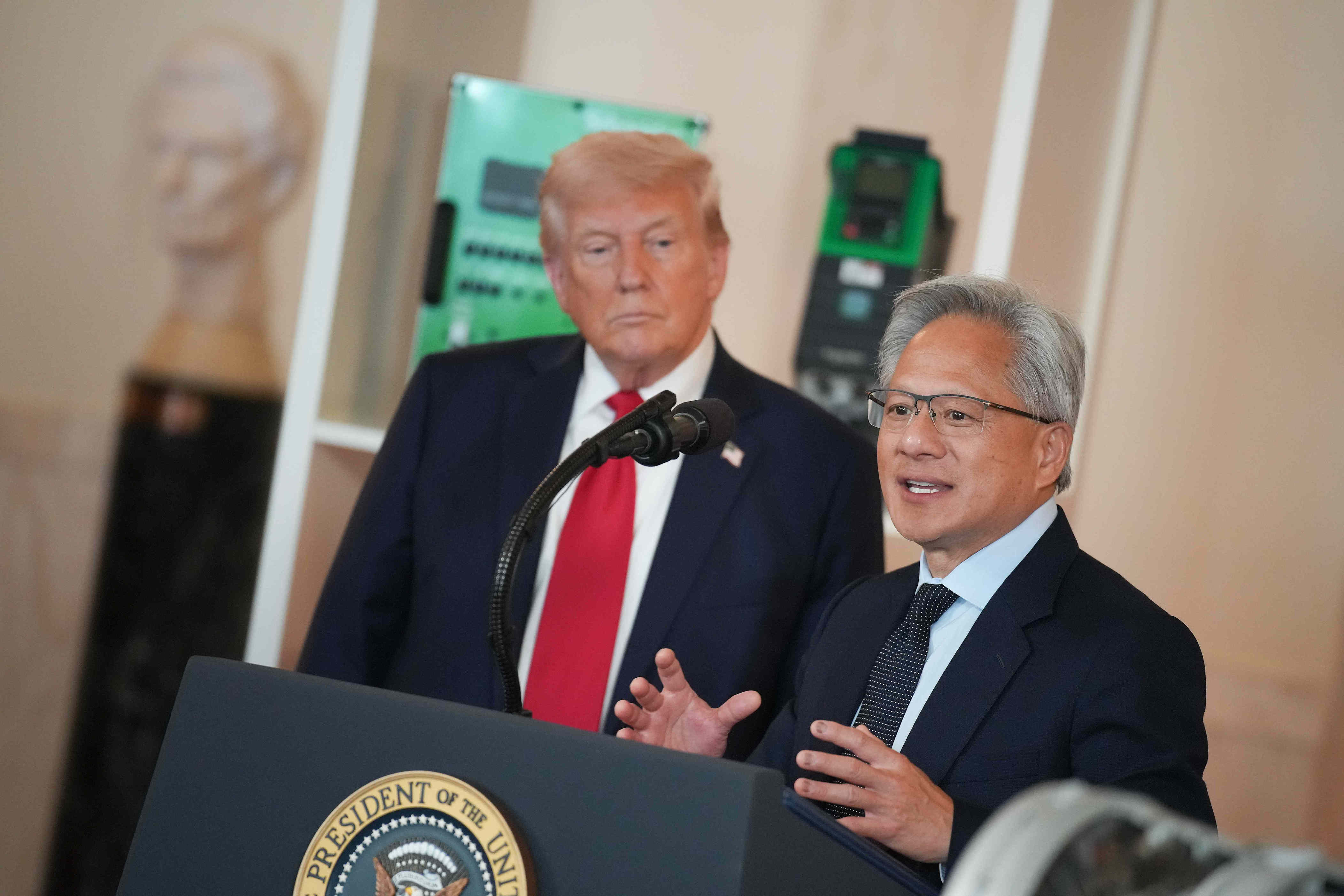 These chip stocks are rising as CEOs join Trump at China summit