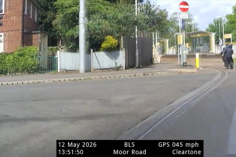 Watch moment police car rams e-bike sending rider cartwheeling over the ...