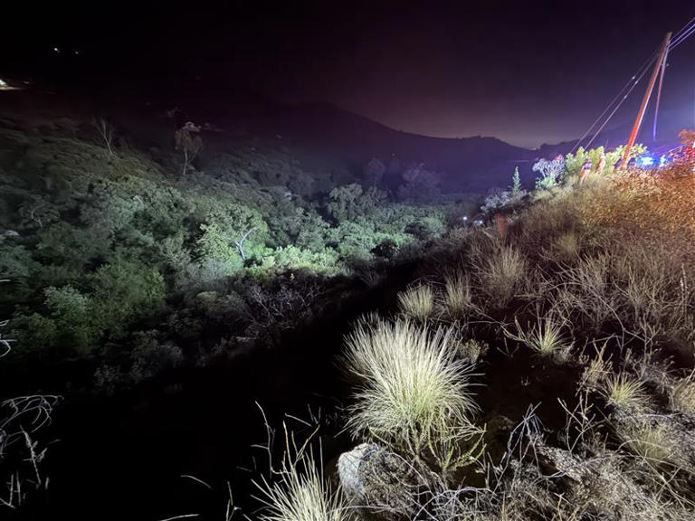 One dead after vehicle plunges down embankment, catches fire in East County