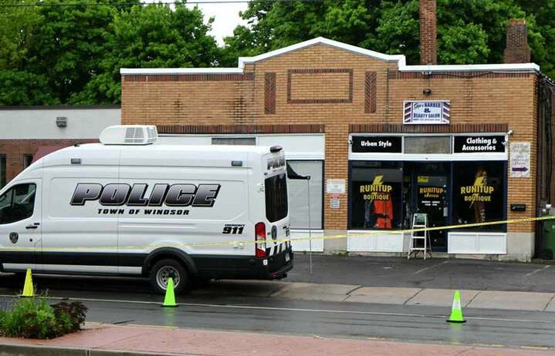 Masked gunmen open fire on Windsor commercial building, police say