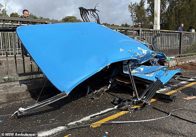 Prized vintage car worth up to $100K is cut in two in horror crash