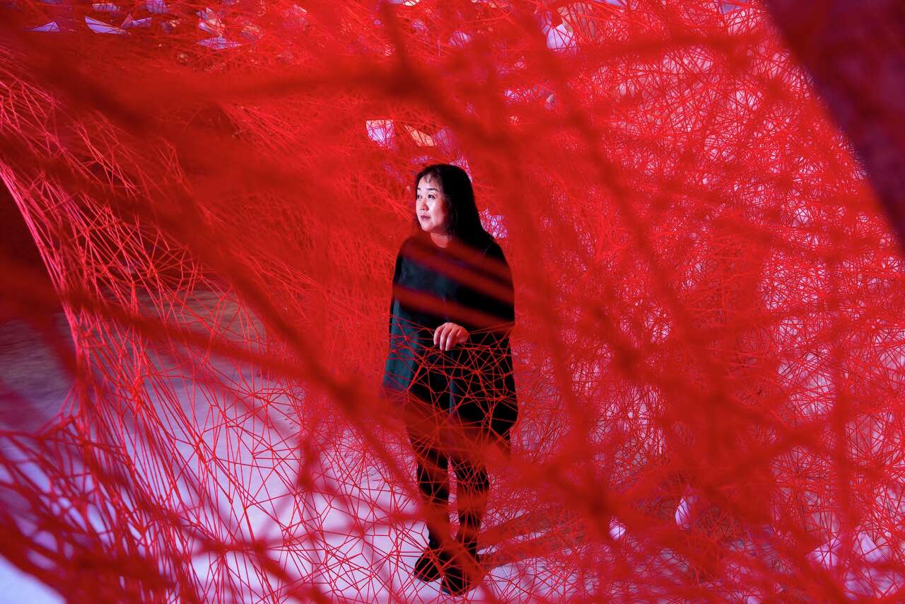'She rips your heart out': This Japanese artist's fiery red ...