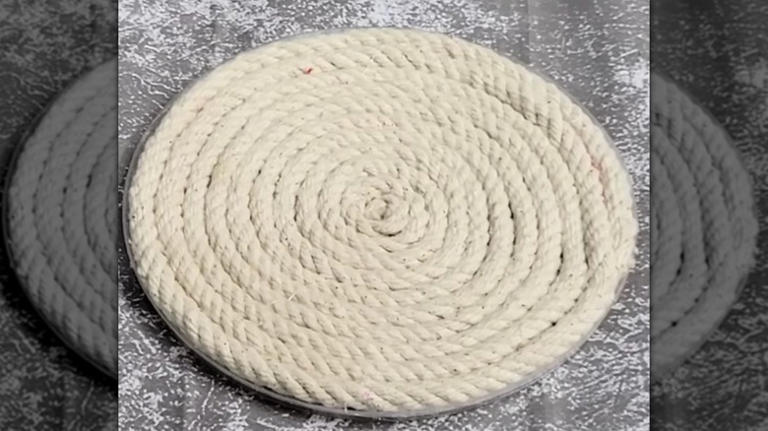 Turn an old lid into a kitchen accessory that'll protect your countertops