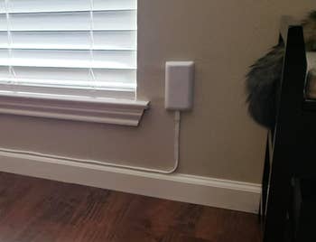 A customer review photo of an outlet using the power strip
