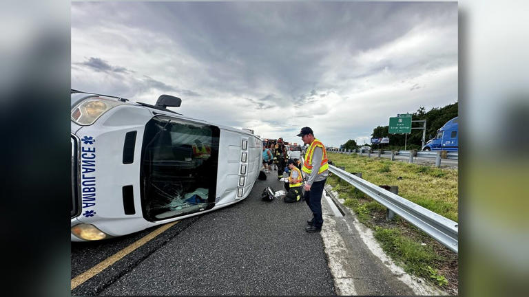 Ambulance rollover crash on I-75 sends three to hospital