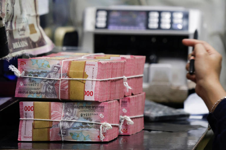 Bank Indonesia delivers first rate hike in years as rupiah flounders ...