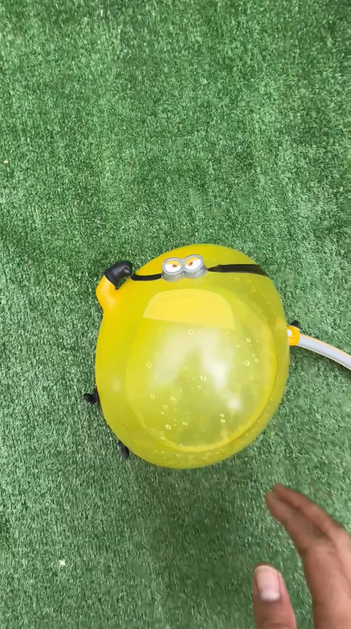 Flooded garden toy inflation experiment: The ultimate pop test