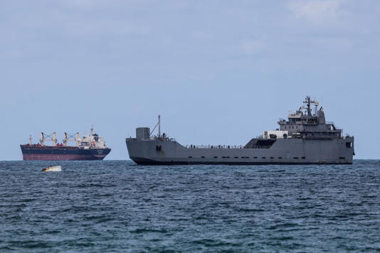 An Israeli naval vessel arrives at Ashdod port, on the day an Israeli rights group and the Global Sumud Flotilla's organizers said activists aboard the Gaza-bound flotilla were intercepted by Israeli naval forces and are being detained at an Israeli port, as seen from Ashdod in southern Israel on Wednesday. (Amir Cohen/Reuters)