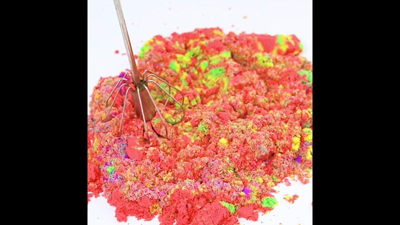 Satisfying whisk pressing soft mixed sand tower creating detailed ...