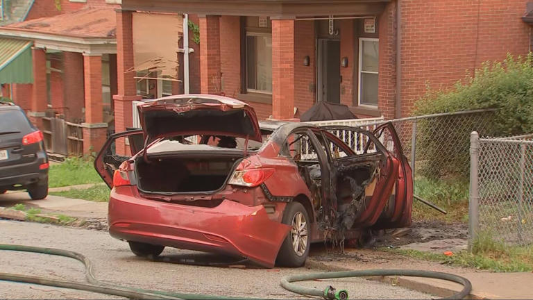 Car crashes into fences, catches fire in Pittsburgh neighborhood