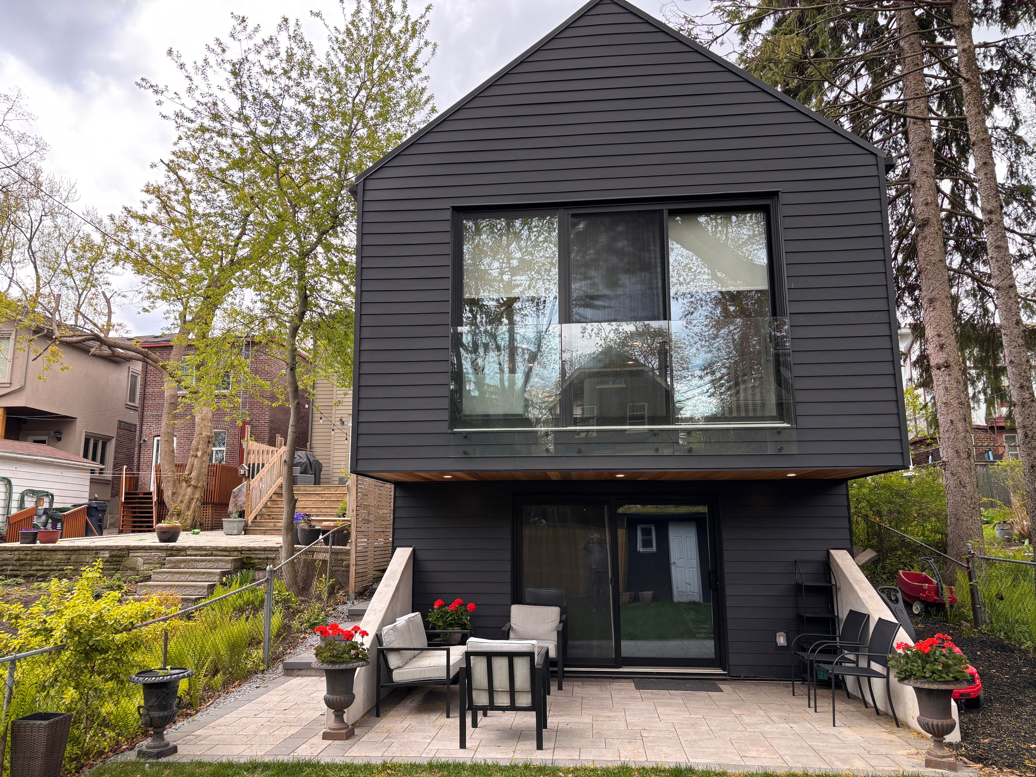 View of Inside a sloped two-storey Danforth garden suite that looks like a barn ...