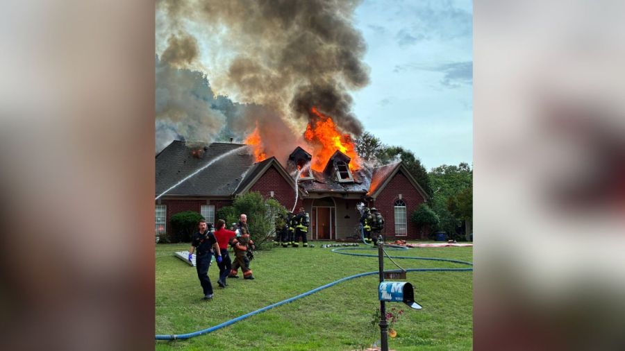 Fire crews battle raging blaze at Olive Branch home