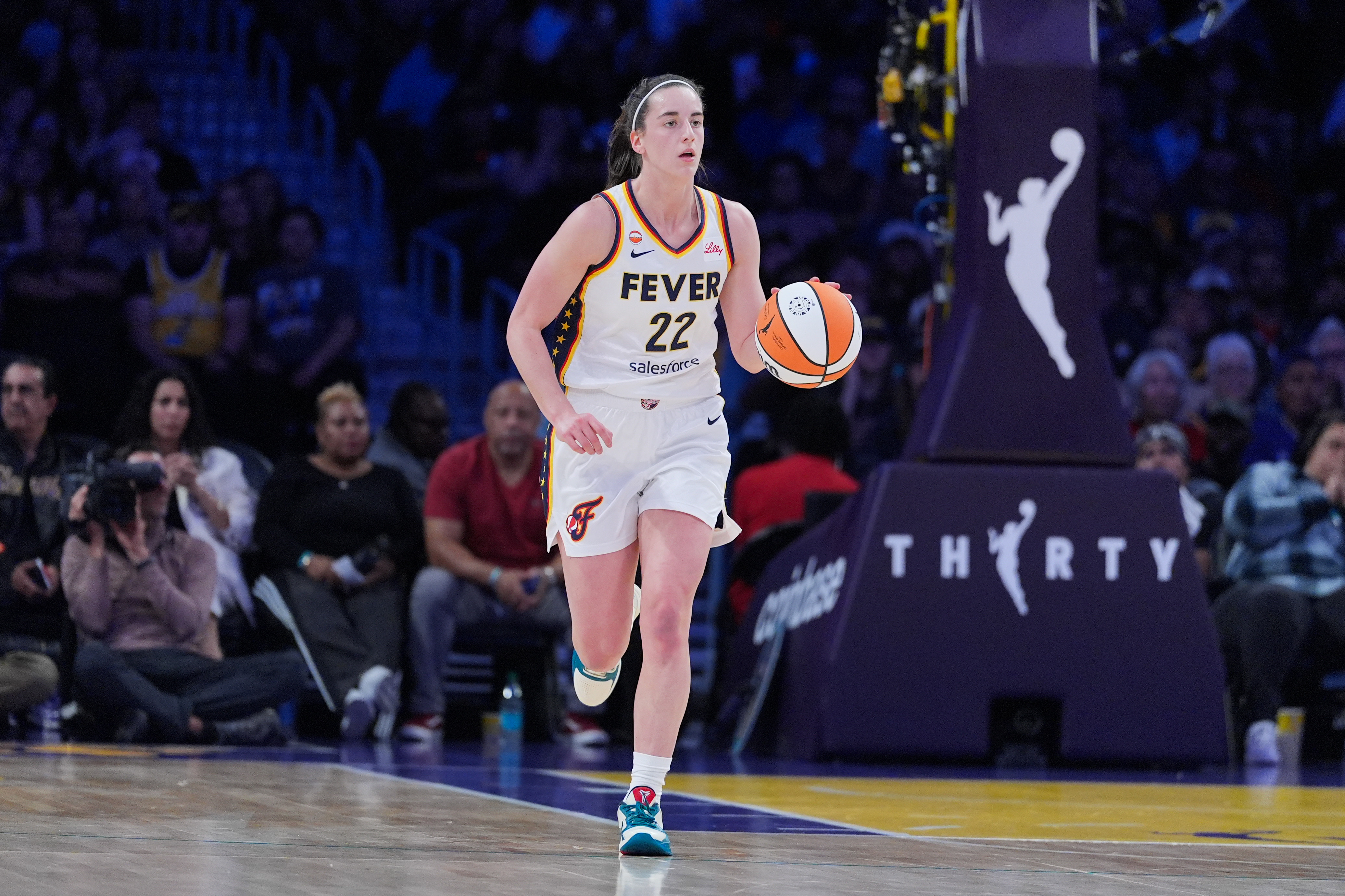 Caitlin Clark sidelined for Fever vs. Fire with back injury, her first game  missed this season
