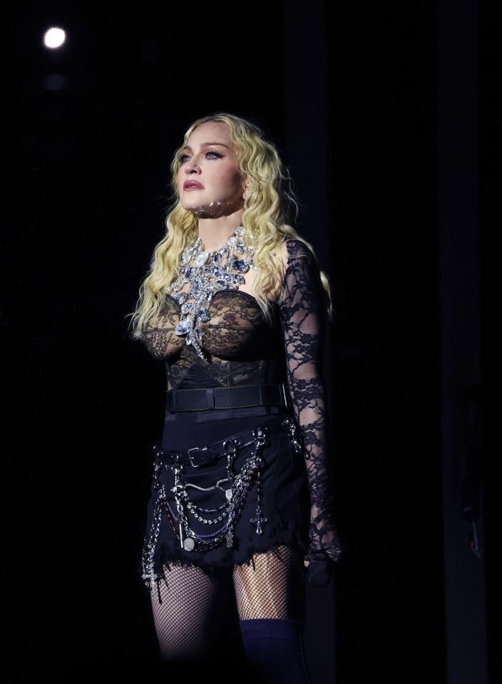 Madonna, 67, dances on a disco floor in a lavender mesh minidress