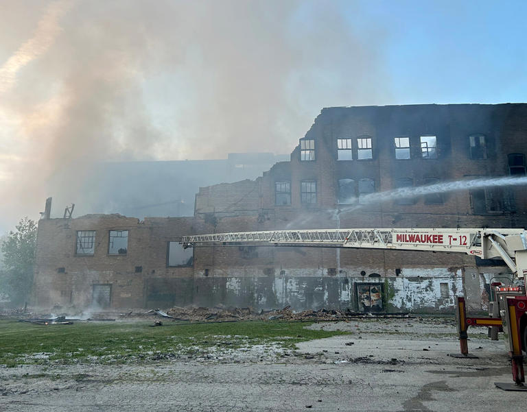 A five-alarm fire destroyed a vacant warehouse on Milwaukee's north side