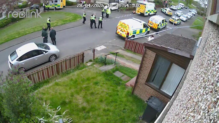 Video shows car crash into parked vehicle as two police officers injured