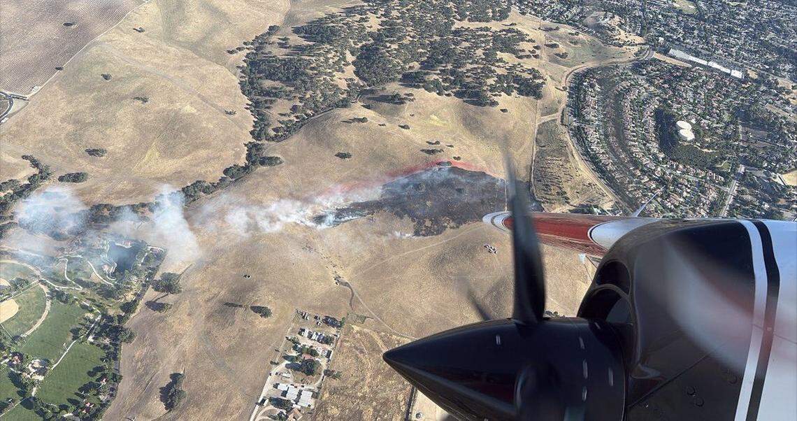 A Paso Robles vegetation fire threatened homes. What caused it?
