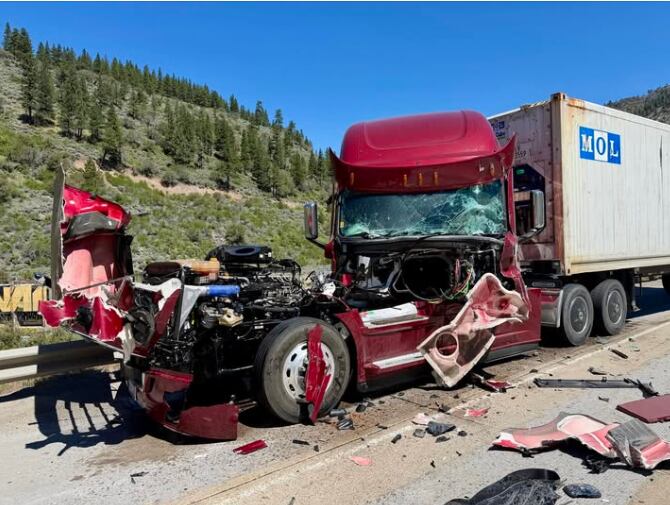 Big rig rear-ends big rig, ripping apart the front of the cab, officers say