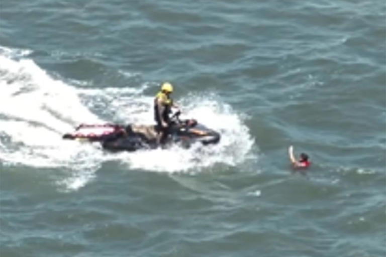 4 people and their dog rescued after boat capsizes near NC island
