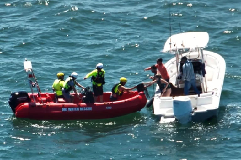 4 people and their dog rescued after boat capsizes near NC island