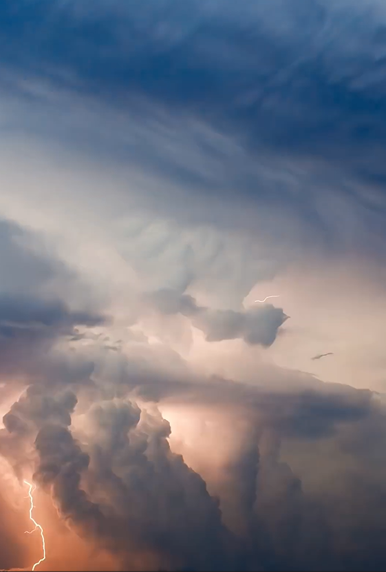 Churning skies and lightning storm chasing footage