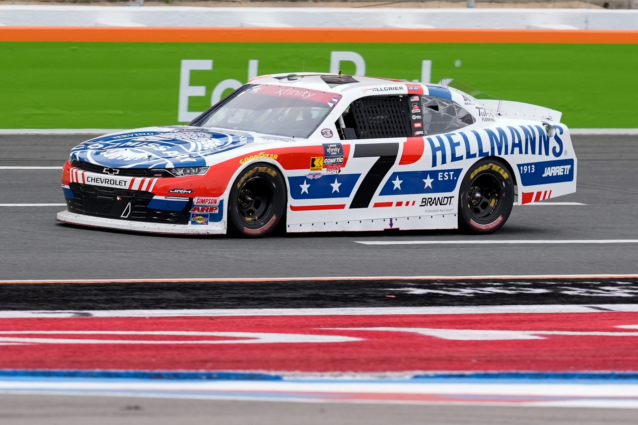 May 24, 2025; Concord, North Carolina, USA; Justin Allgaier (7) takes the lead after the first period during the Bet MGM 300 at Charlotte Motor Speedway. Mandatory Credit: Jim Dedmon-Imagn Images