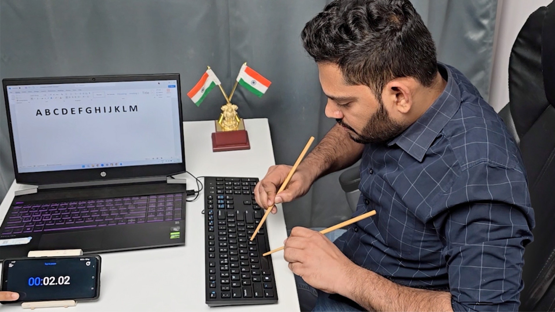 Fastest time to type the alphabet using chopsticks (both hands) - 4.91 ...