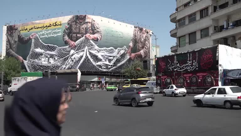 Iran propaganda push seeks to project unity despite internal divisions