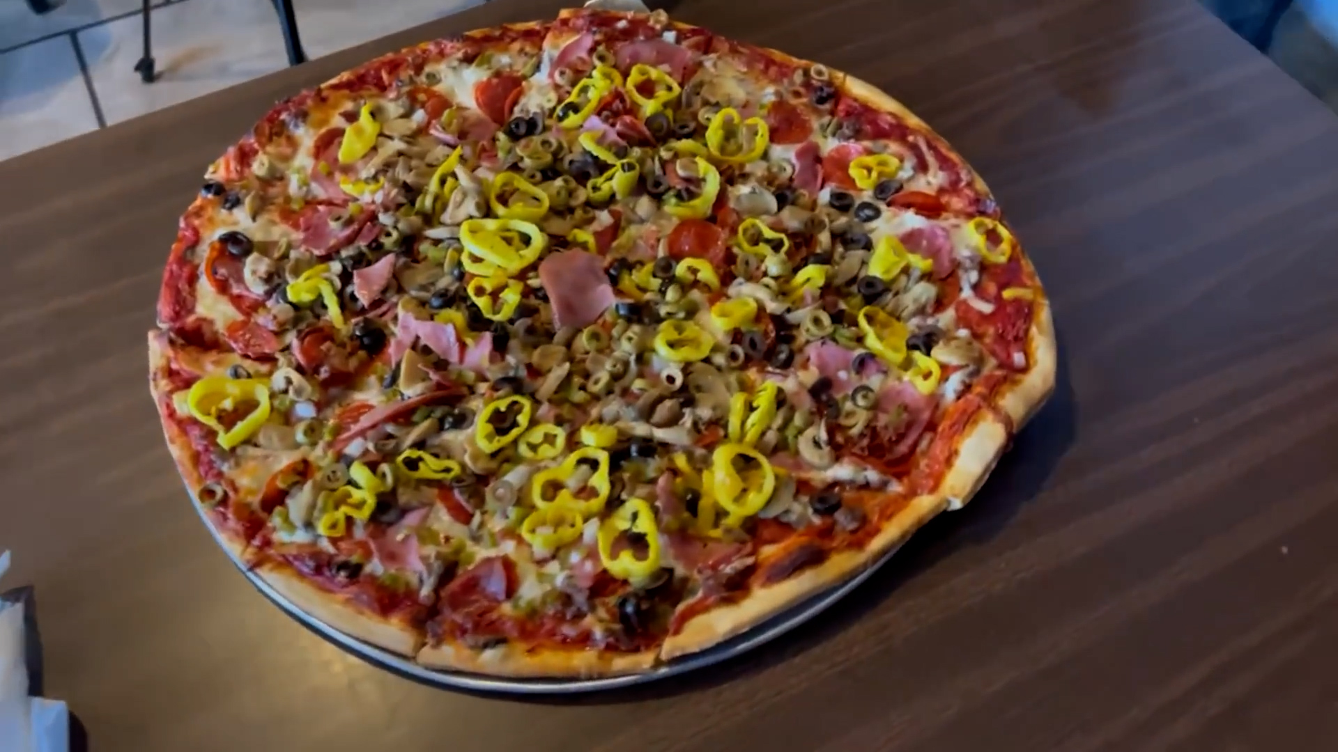 Man attempts giant 20-inch pizza challenge loaded with 11 toppings