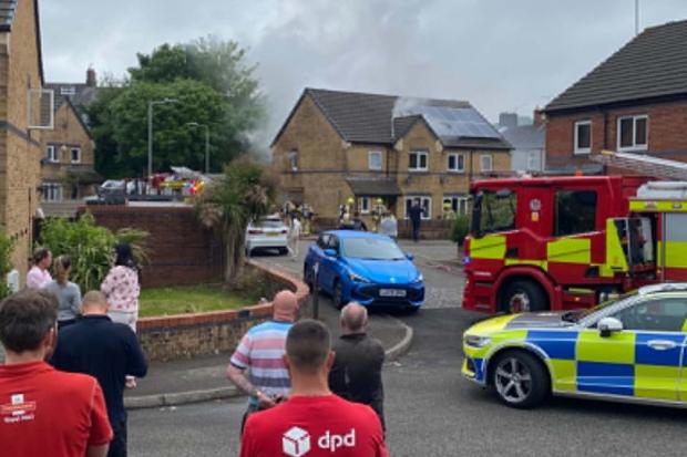 Two arrested after large house fire at Newport estate