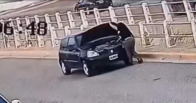 Horrifying moment driver run over by her own car while checking battery ...