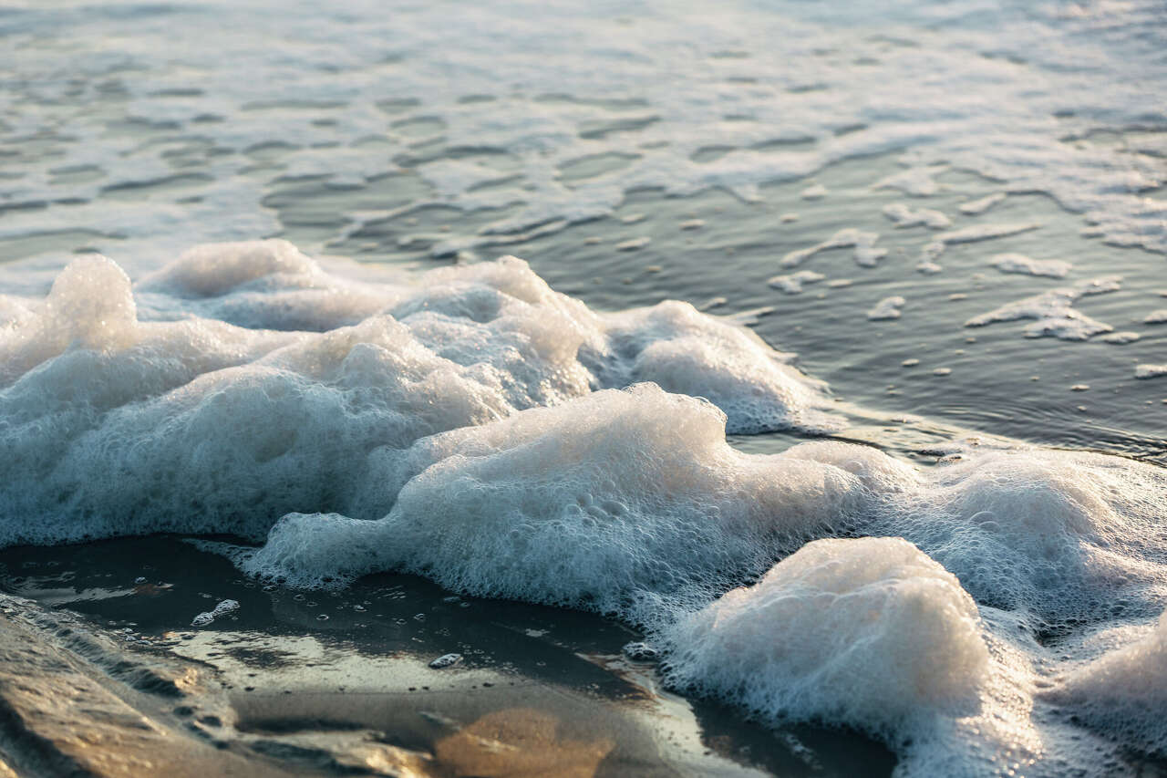 Michigan warns swimmers, boaters to avoid lake and river foam over PFAS ...