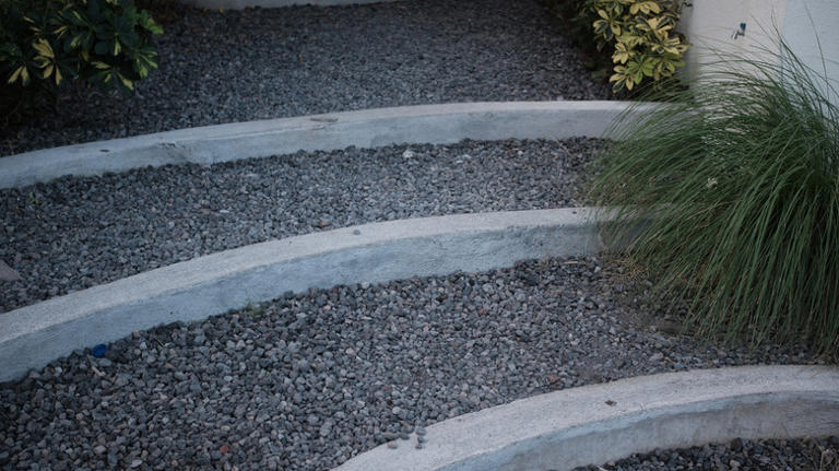 The best tool for raking gravel walkways or paths on a slope