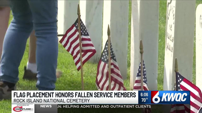 Volunteers place flags at Rock Island National Cemetery ahead of ...