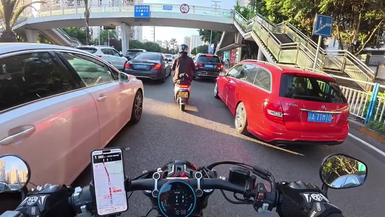 Two e-scooter riders collide while passing through traffic in Chongqing ...