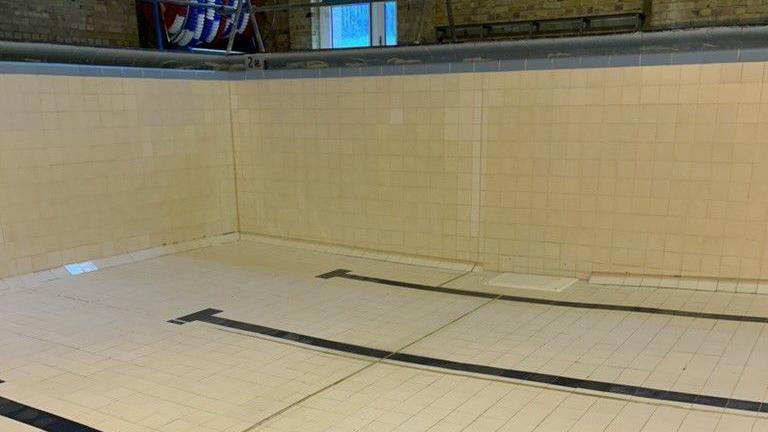 Pool's future secured after charity buys it for £1