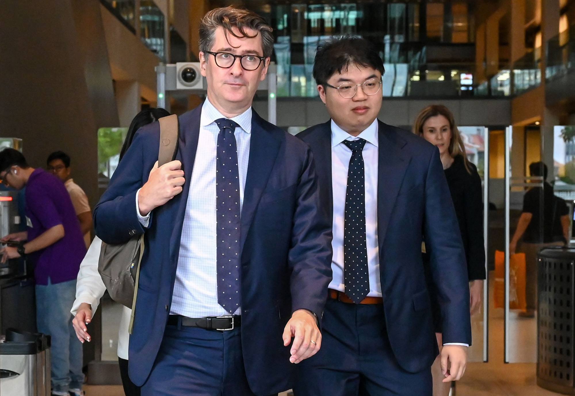 Bloomberg accused of 'unprecedented' malice as Singapore ministers ...