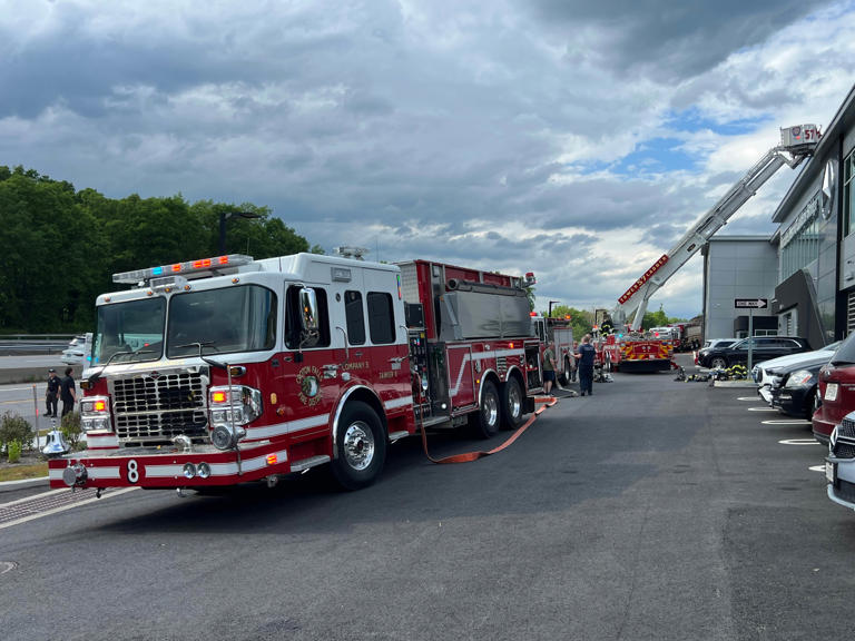 Firefighters tackle brush fire, then a roof fire at Route 22 Mercedes ...