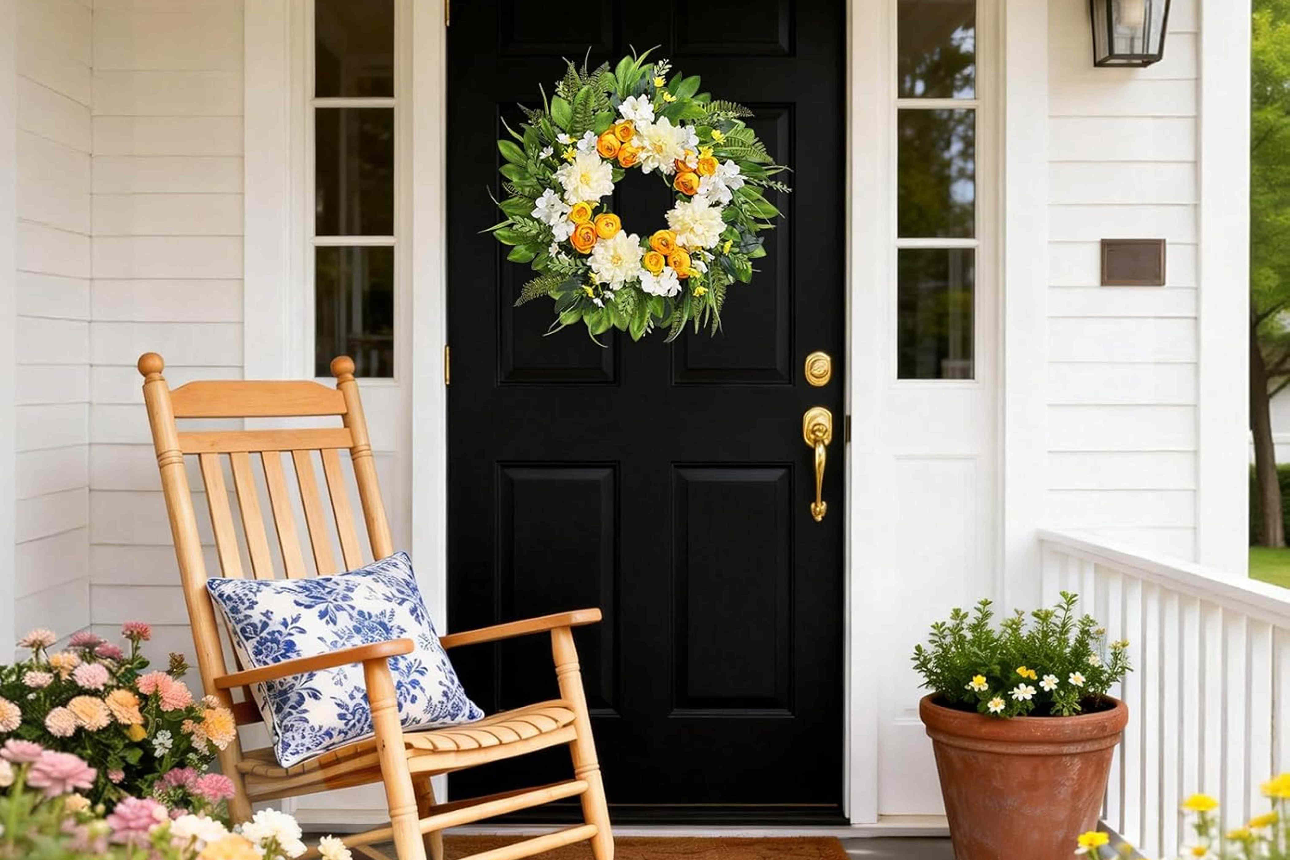 These 12 budget-friendly Amazon porch upgrades are all under $25—shop doormats, solar lights, deck boxes, and more