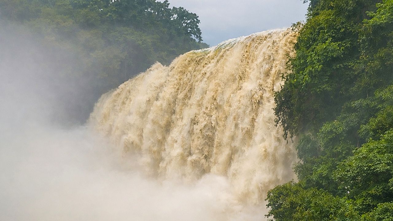 Floodwaters send China's Huangguoshu Waterfall into dramatic overflow